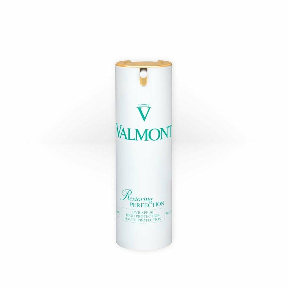 Cilindro bianco con chiusura dorata. Scritta verde: VALMONT, Restoring Perfection, SPF 50.