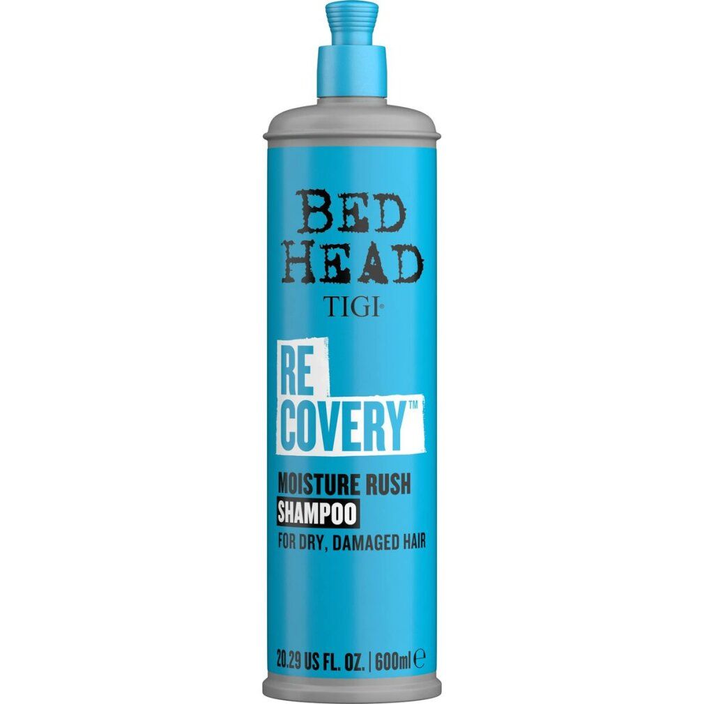 Flacone di shampoo turchese con tappo grigio. Scritta: Bed Head Tigi Re-covery Moisture Rush Shampoo. Per capelli secchi e danneggiati.