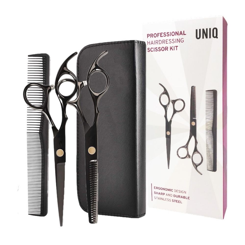 Set da parrucchiere con due forbici, pettine e custodia nera, confezionato in scatola.