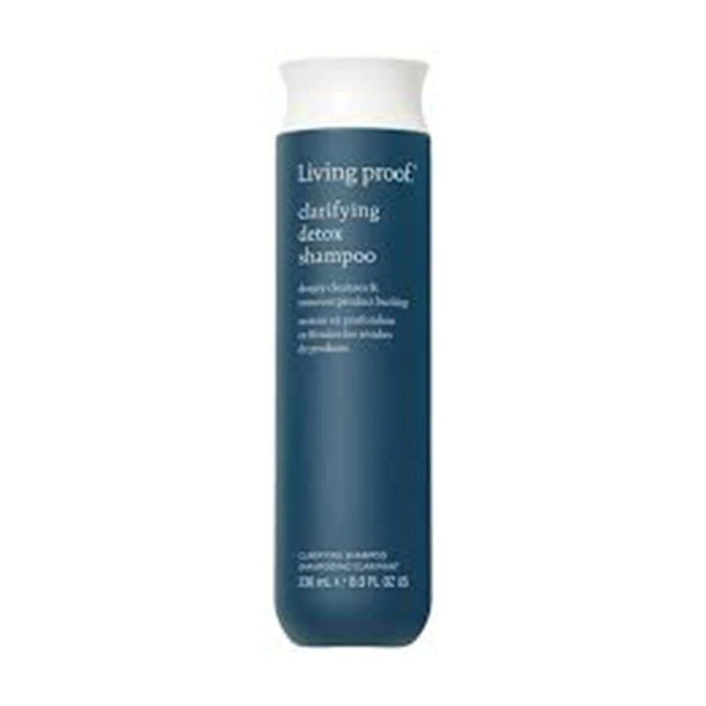Flacone di shampoo blu turchese con tappo bianco. Scritta: Living Proof, clarifying detox shampoo. 236 ml.