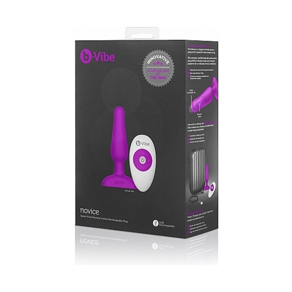 Confezione del prodotto. Scatola nera con plug, telecomando e illustrazioni. Testo: novice. Marchio b-Vibe. Riconoscimenti.