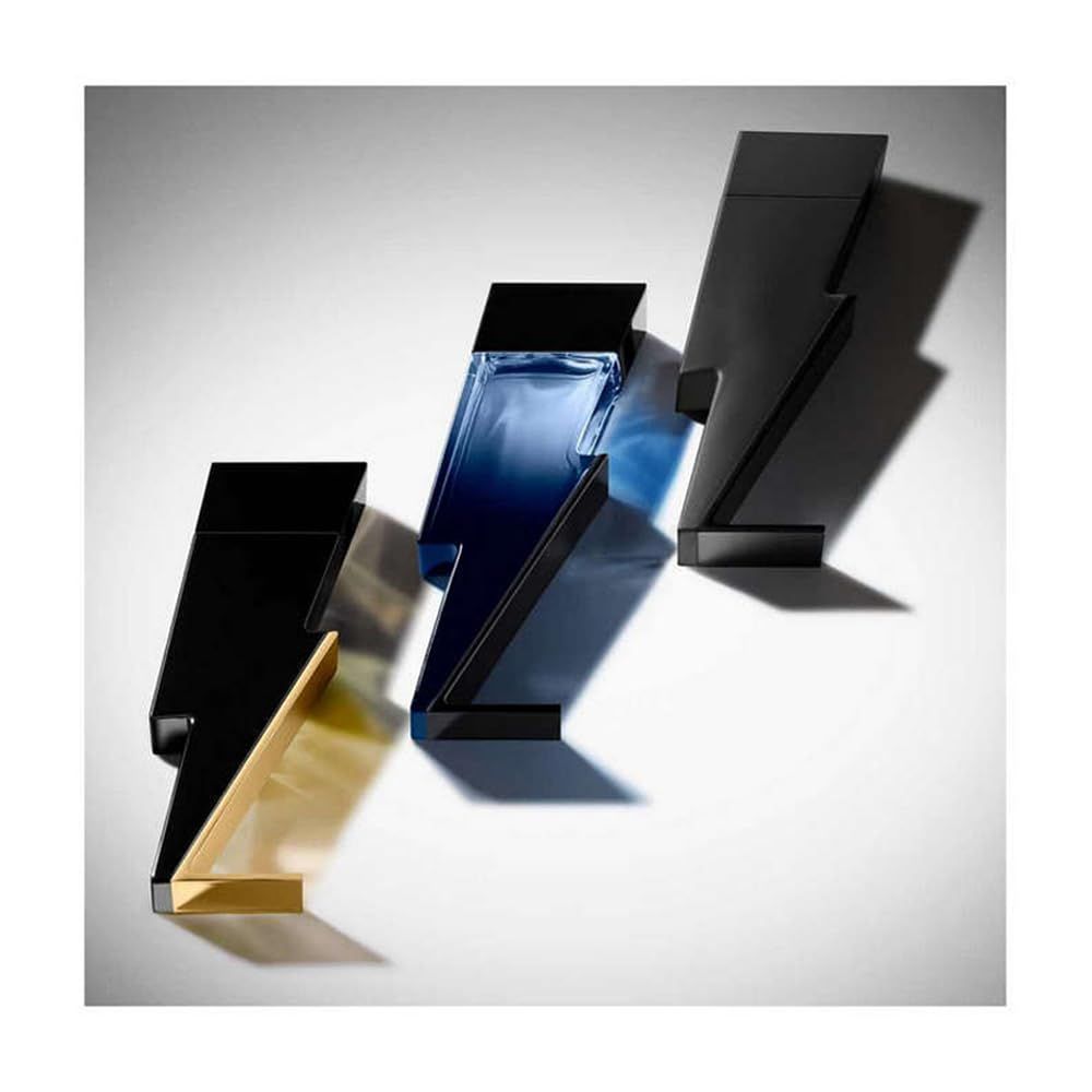 Tre flaconi a forma di fulmine. Nero, blu e nero con base dorata.
