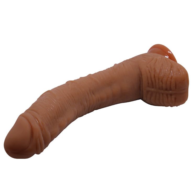 Dildo beige con superficie strutturata e ventosa. Forma fallica, leggermente curva.