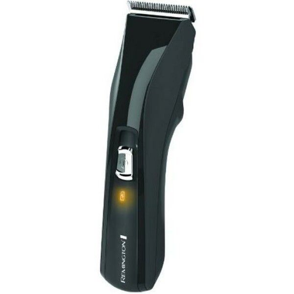 Tagliacapelli nero. Visibili: interruttore on/off, indicatore di carica, testina. Marchio: Remington.