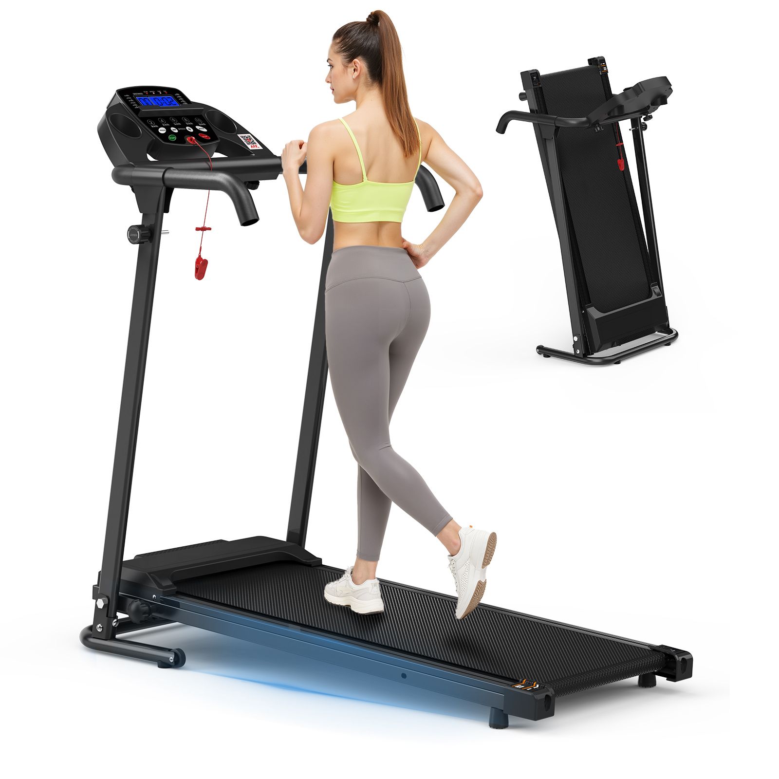 Donna che corre su un tapis roulant nero. Un secondo tapis roulant piegato è visibile sullo sfondo.