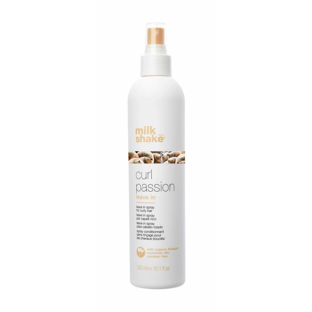 Flacone bianco con vaporizzatore. Scritta: Milk Shake, Curl Passion Leave In. Testo in nero. 300 ml.