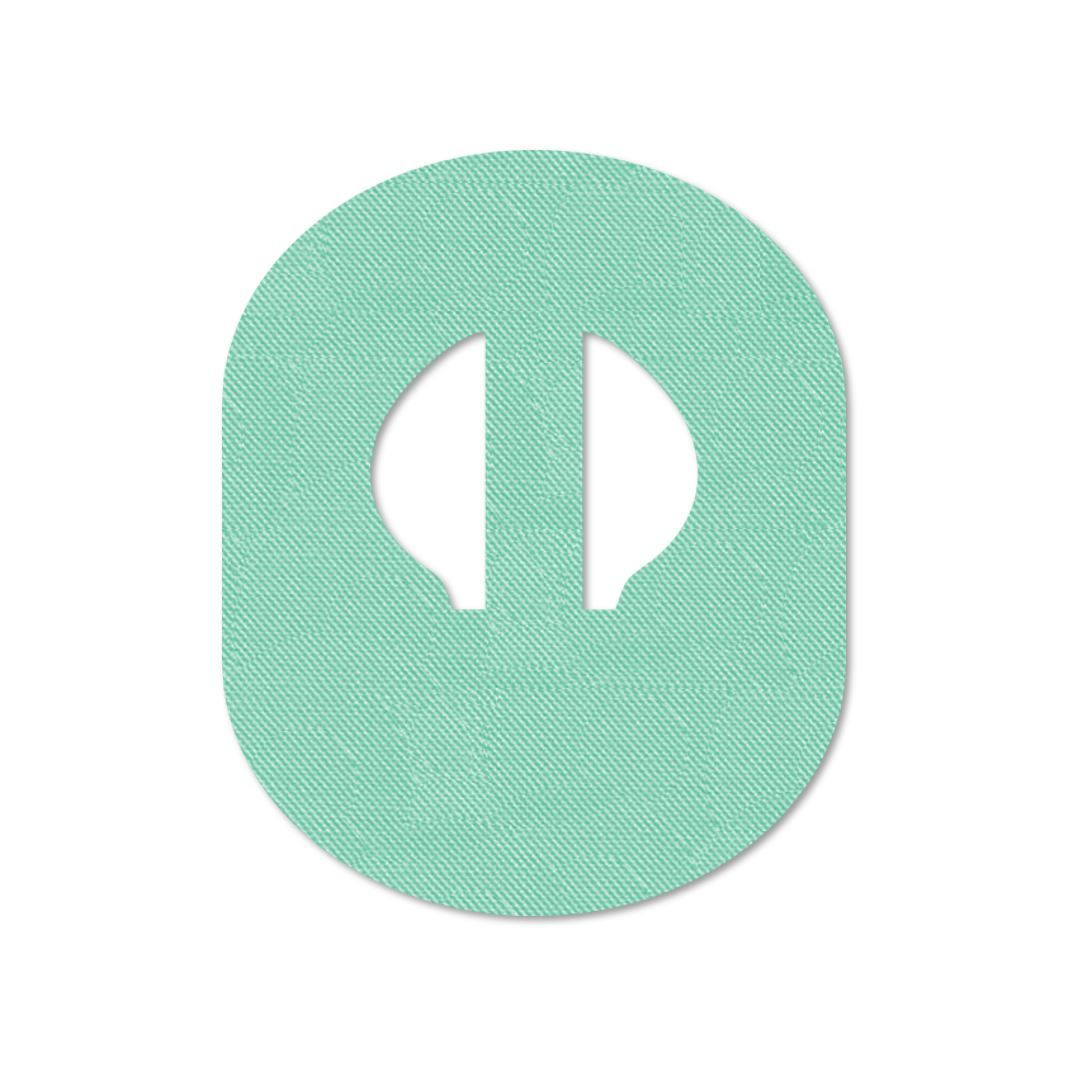 Cerotto di fissaggio verde chiaro, ovale con intaglio. Superficie tessile, senza altri dettagli.