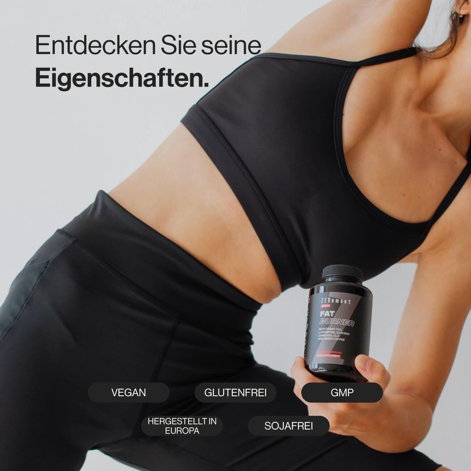 Flacone nero Zenement Fettverbrenner. Vegano, senza glutine, certificato GMP. Donna in abbigliamento sportivo tiene il flacone.