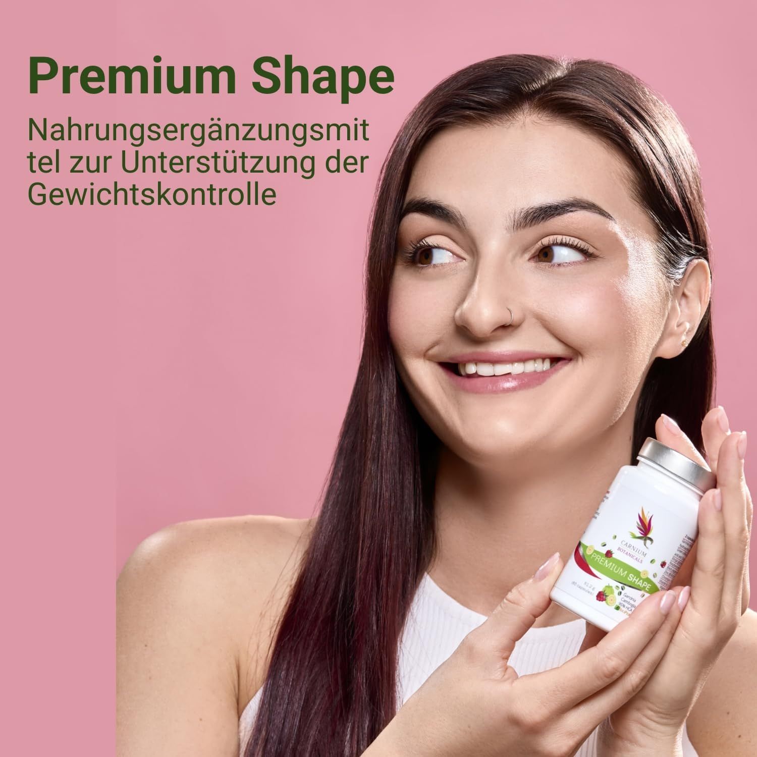 Donna che tiene un flacone bianco. Scritta "Premium Shape". Testo: integratore alimentare per il controllo del peso. Sfondo rosa.