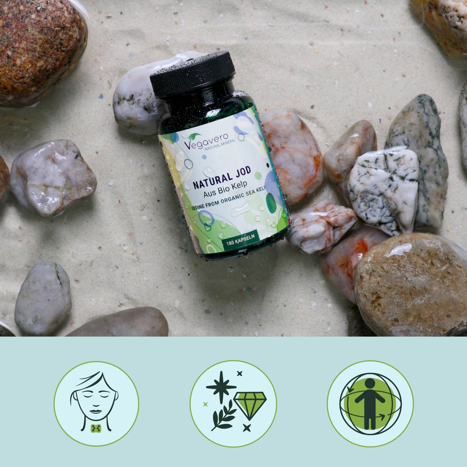 Bottiglia verde con tappo nero su pietre. Scritta: NATURAL JOD, Aus Bio Kelp, 180 capsule. Marchio: Vegavaro.