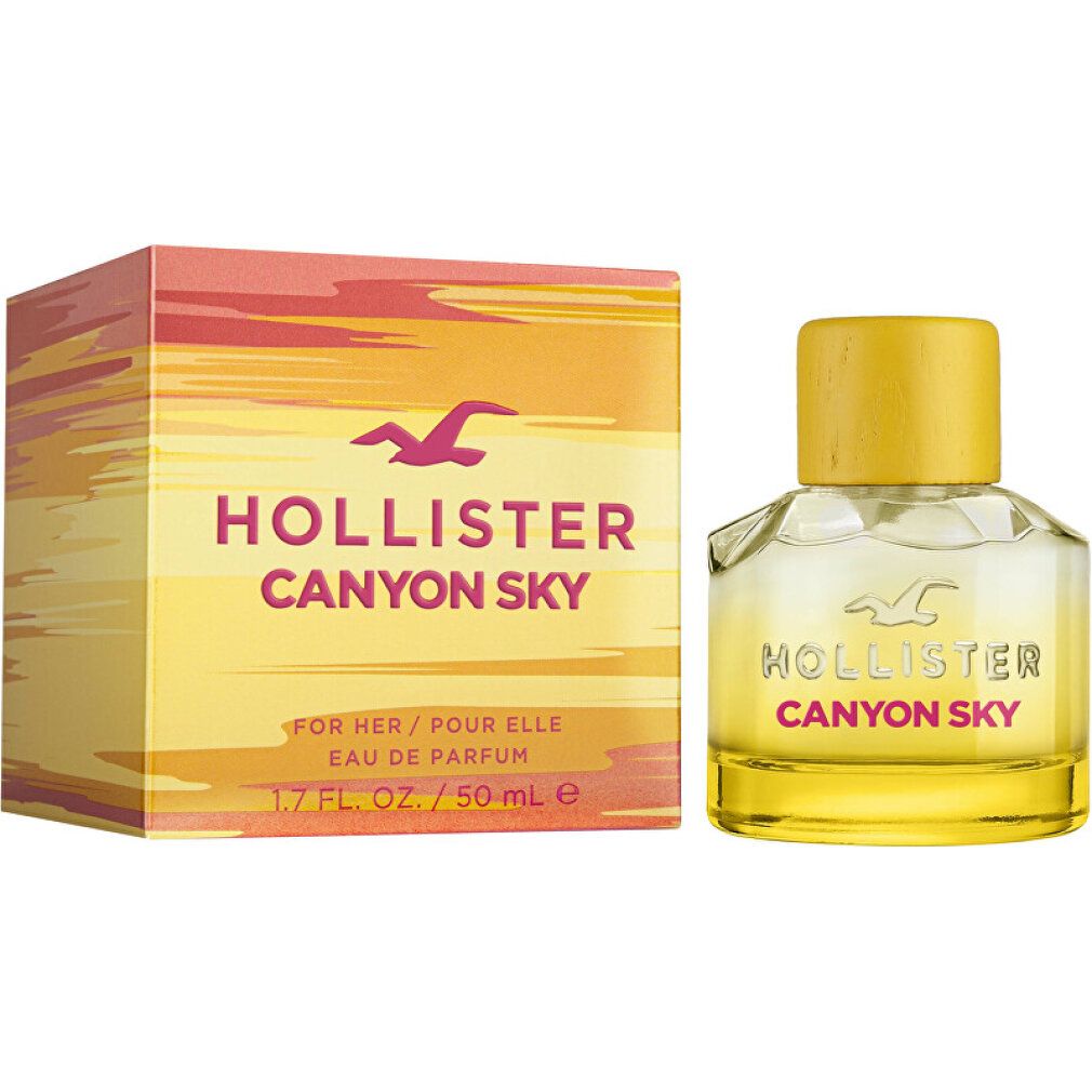 Flacone e confezione. Profumo giallo in flacone di vetro con tappo giallo. Confezione con scritta Canyon Sky.
