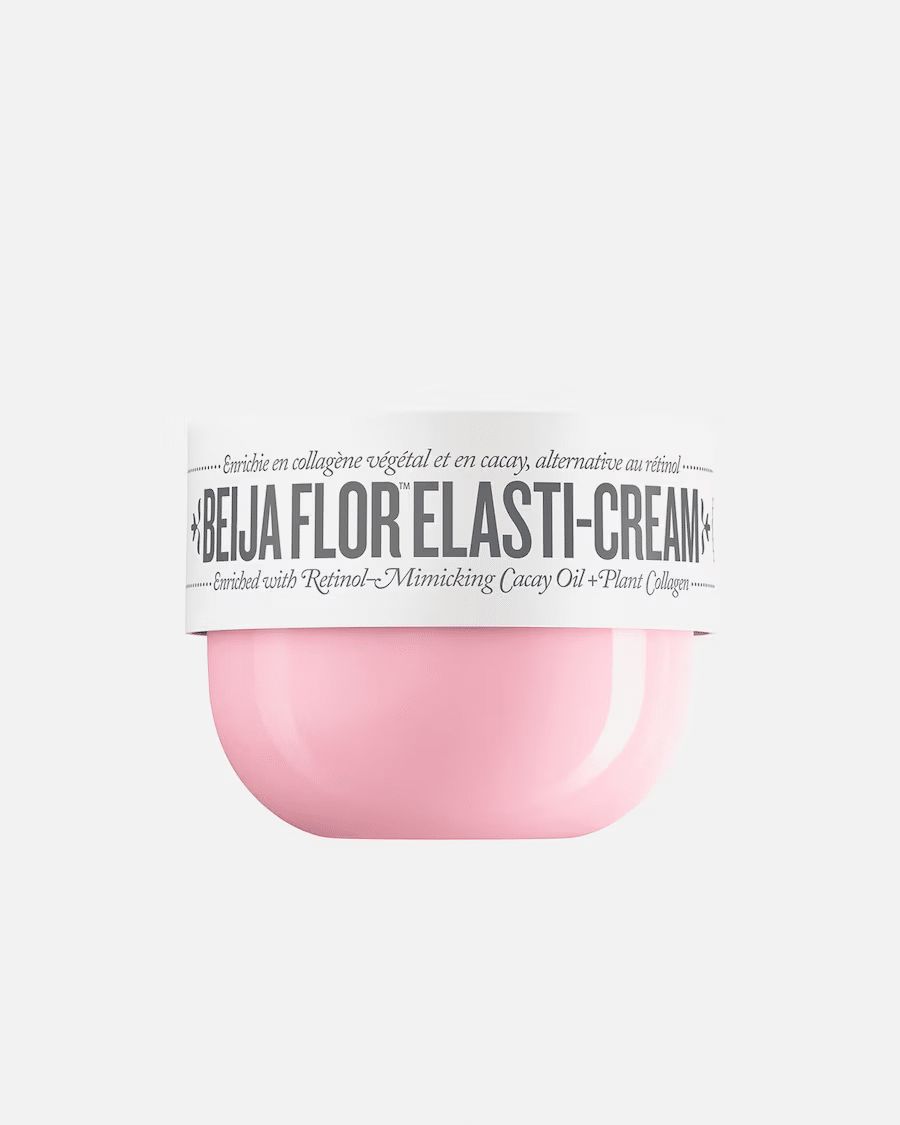 Vaso di crema rosa con etichetta bianca. L'etichetta riporta "BEIJA FLOR ELASTI-CREAM".