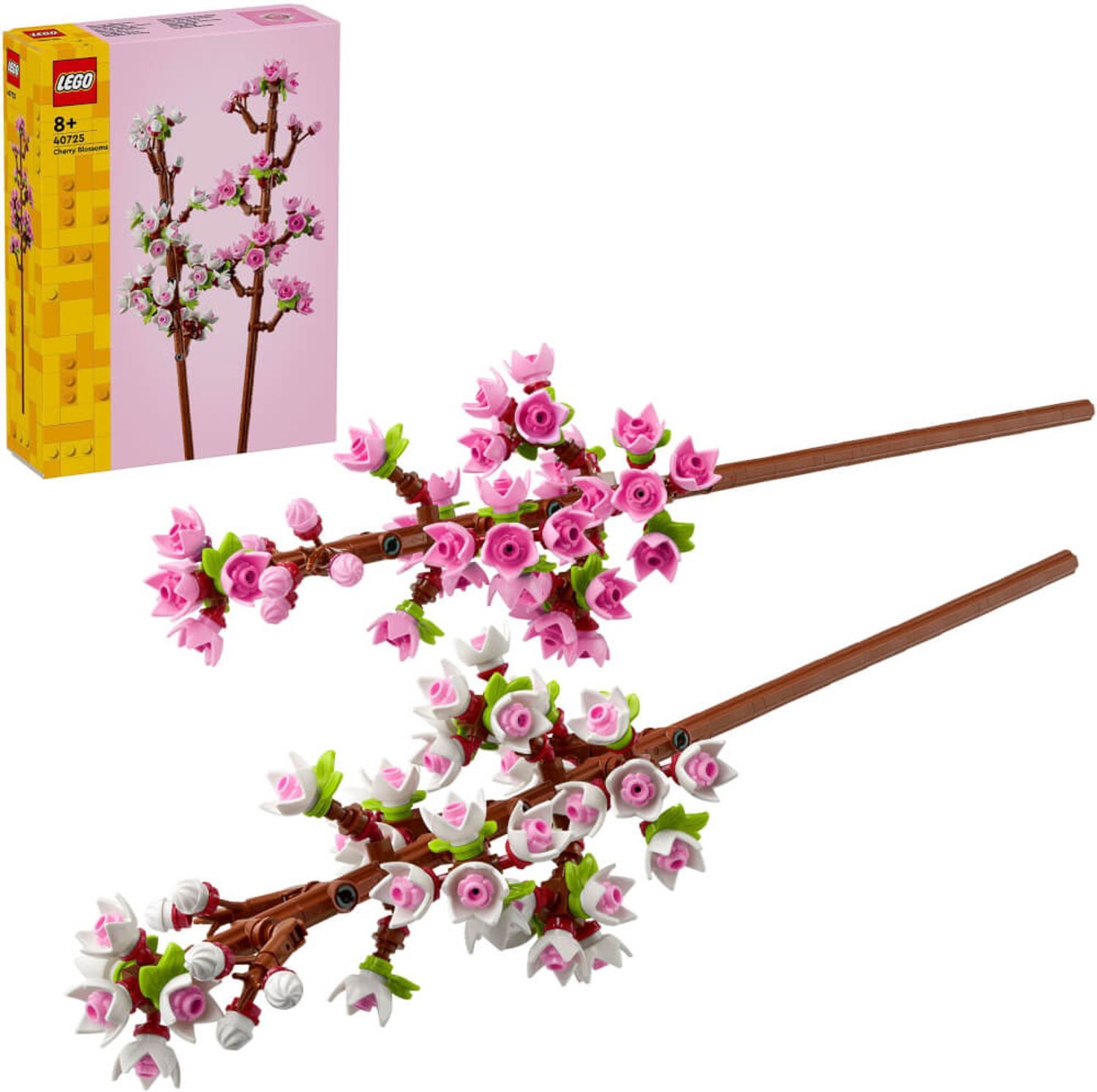 Due rami di fiori di ciliegio in plastica rosa e bianca. Sulla confezione è indicato 8+.