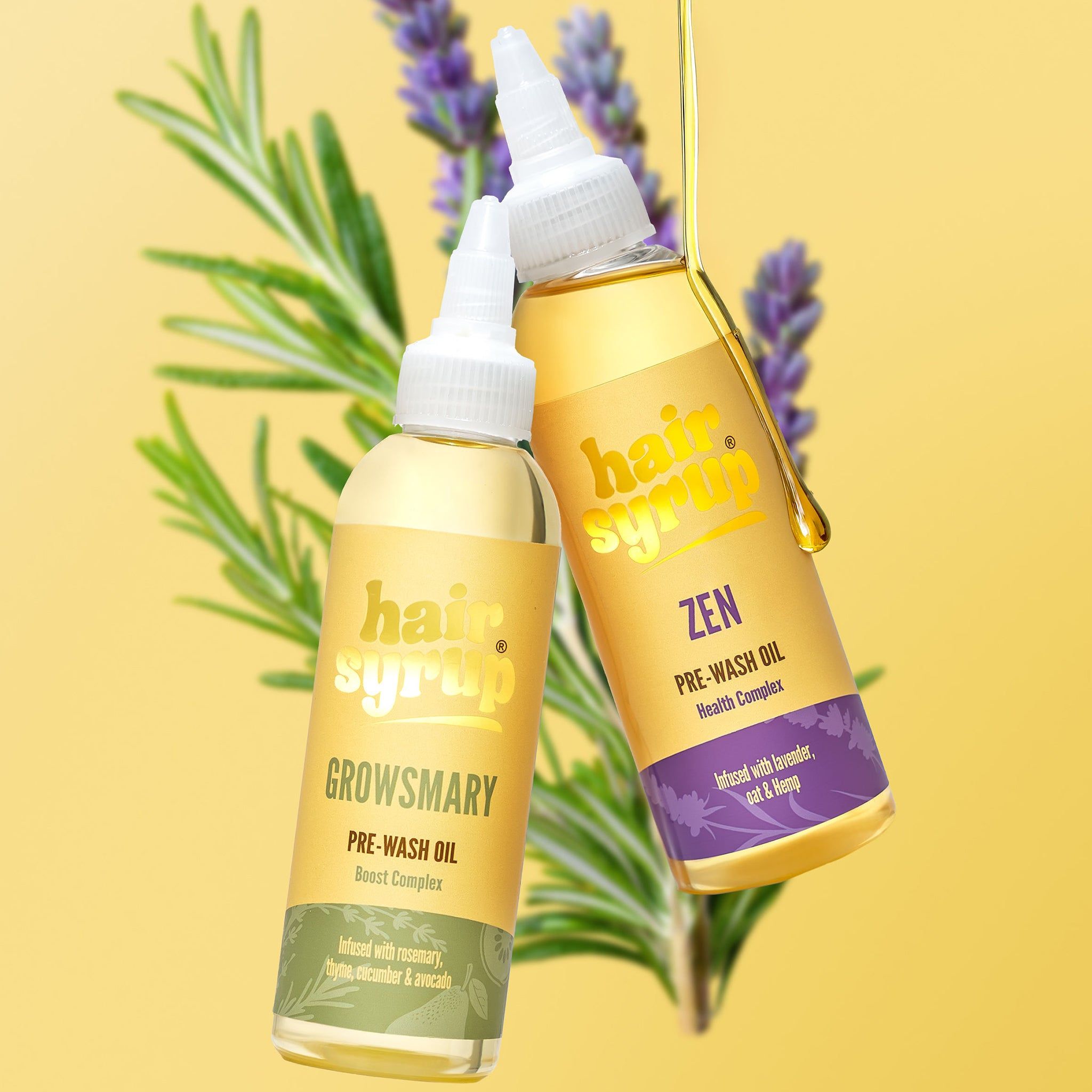 Due bottiglie di liquido giallo con etichette. Una bottiglia versa liquido. Rosmarino e lavanda sullo sfondo.