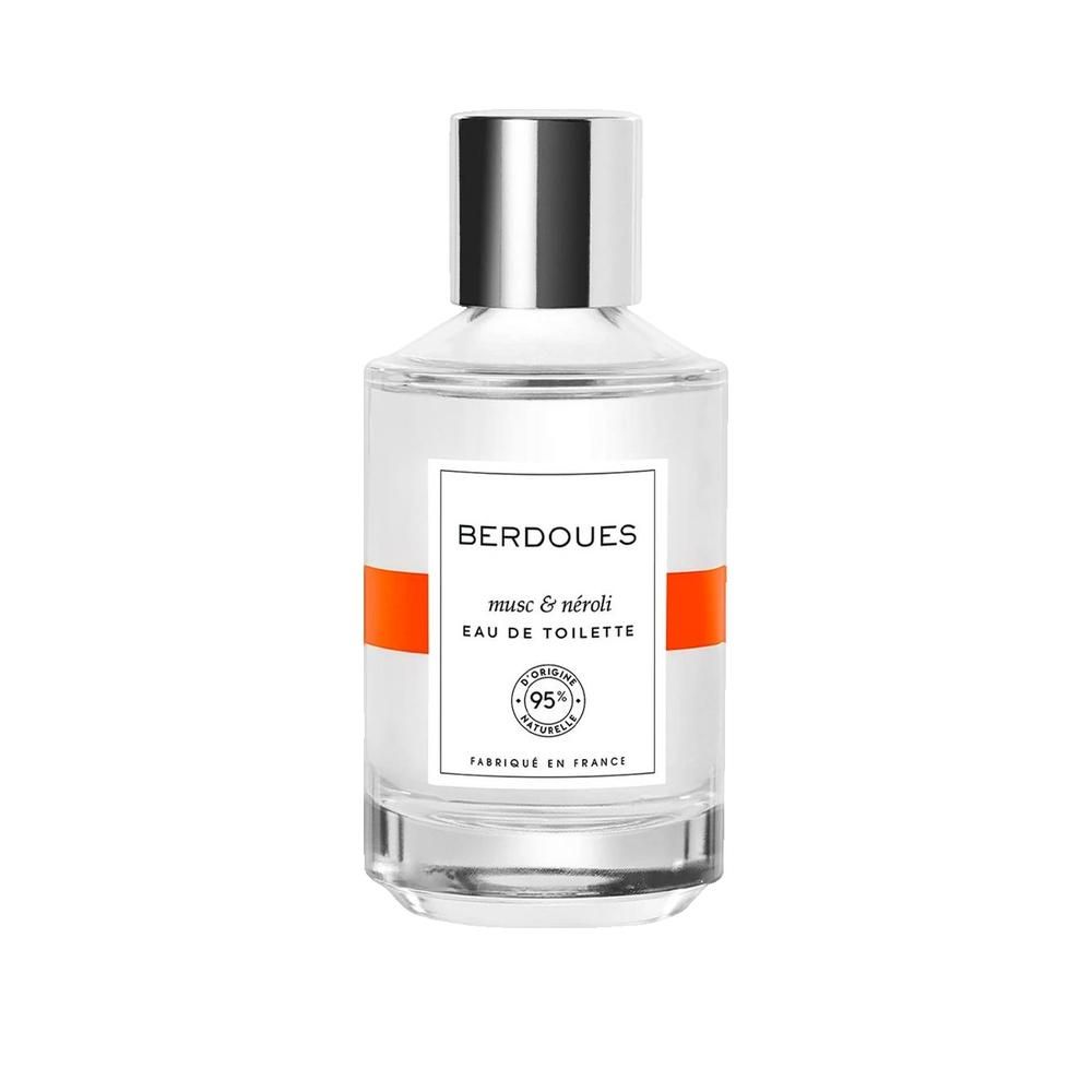 Flacone con tappo argentato, etichetta bianca e fascia arancione. Scritta: BERDOUES, musc & néroli, Eau de Toilette.