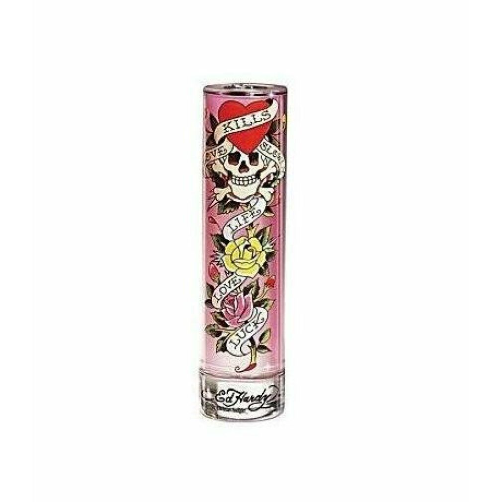 Flacone rosa con design teschio tatuato, rose e scritte. Base in vetro trasparente. Logo Ed Hardy in basso.
