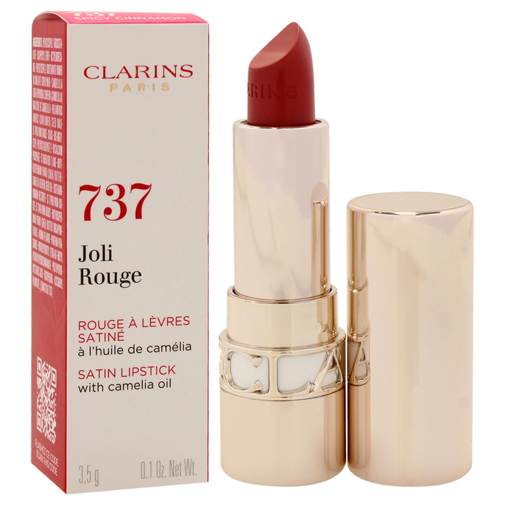 Rossetto Clarins Joli Rouge 737. Rossetto rosso, astuccio dorato, cappuccio aperto. Confezione a sinistra.