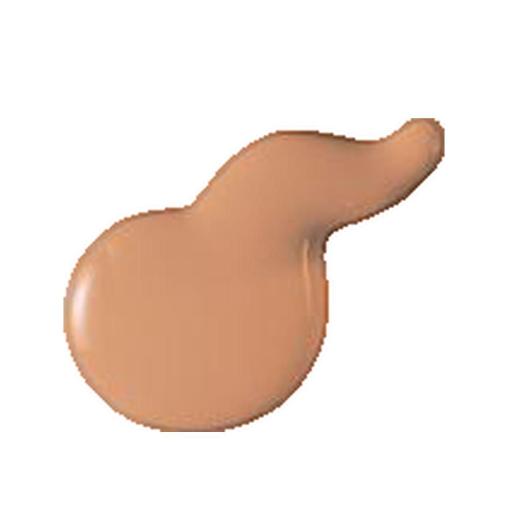 Macchia di fondotinta liquido beige su sfondo bianco.