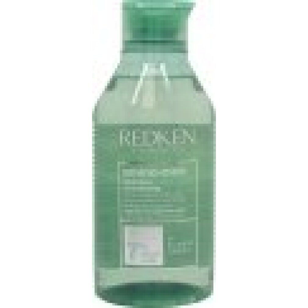Flacone verde di shampoo Redken Amino Mint. Testo: Shampoo, formula pH bilanciata.