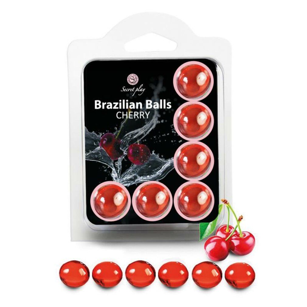 Confezione di palline rosse e rotonde. Scritta "Brazilian Balls Cherry". Ciliegie accanto. Palline rotonde e trasparenti nella confezione e sfuse.