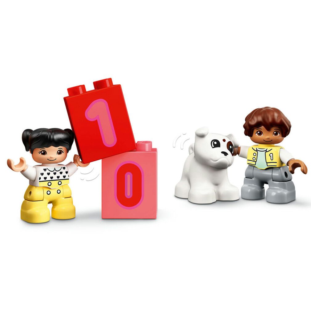 LEGO DUPLO Treno dei numeri. Personaggi tengono mattoncini con numeri 0 e 1. Cane bianco. Immagine del prodotto.