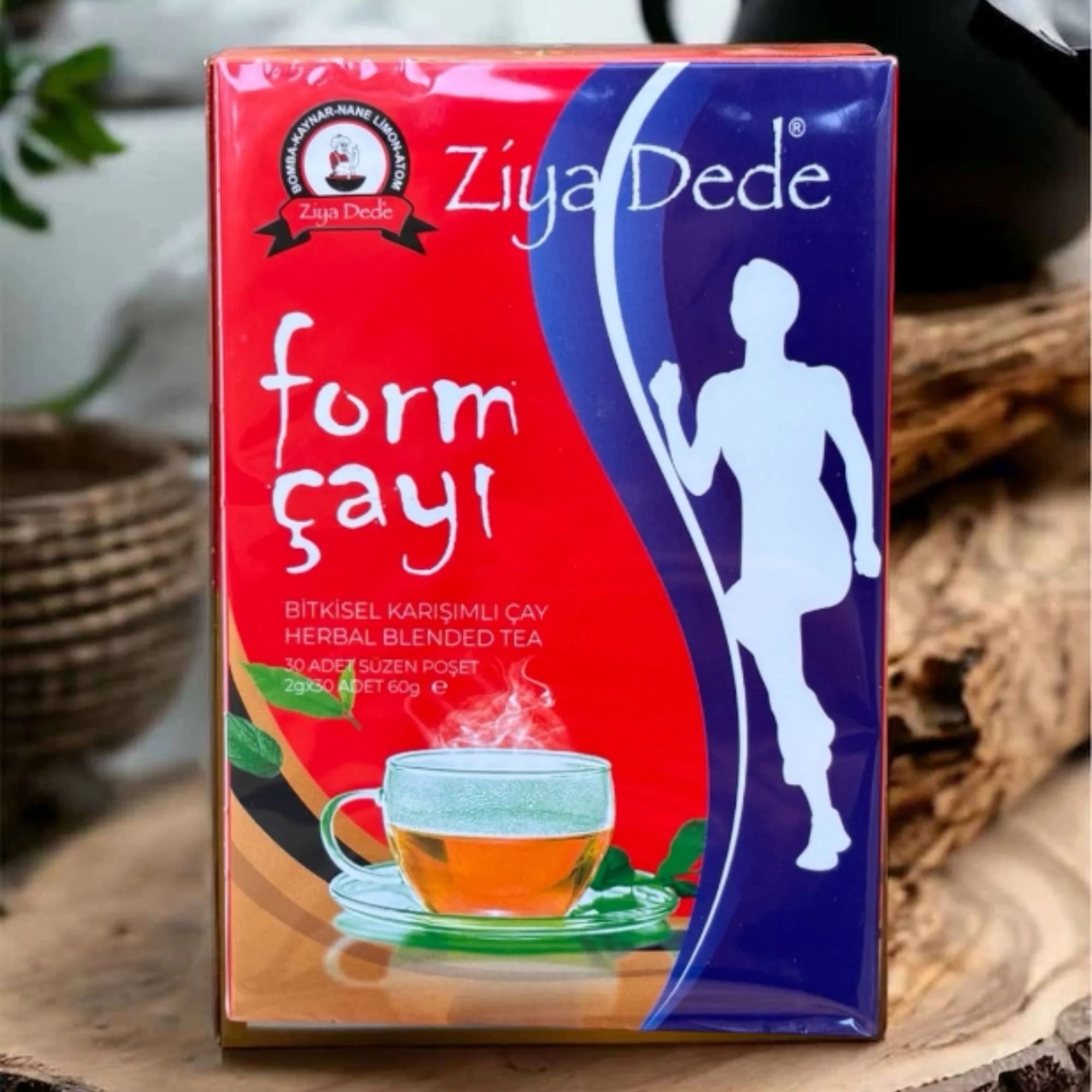 Confezione con logo e testo. Illustrazione di una tazza di tè e una persona. Testo in turco.