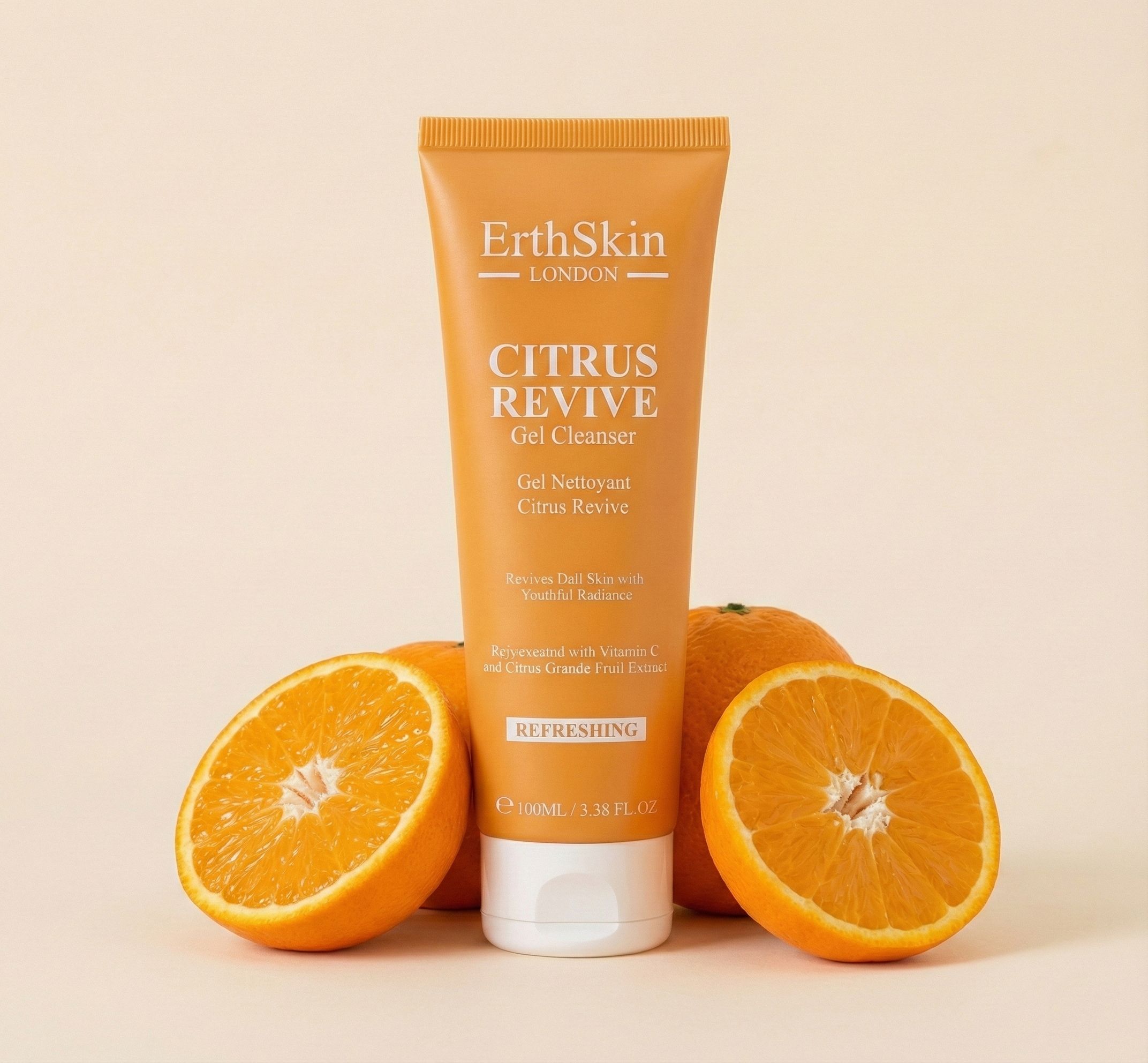Tubo arancione con nome del prodotto e arance. Scritta: ErthSkin London CITRUS REVIVE Gel Cleanser. Due metà di arancia.