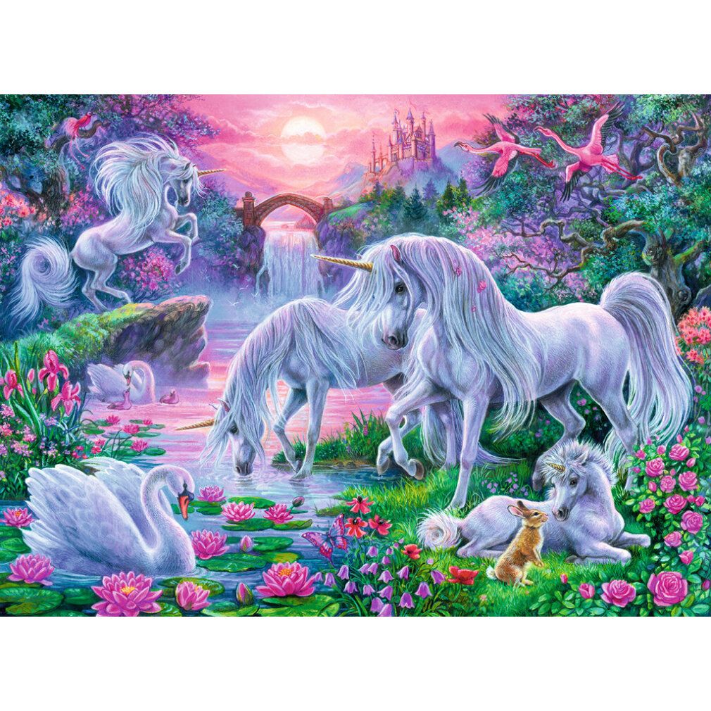Puzzle con unicorni al tramonto. Scena con unicorni, cigni, cascata e castello sullo sfondo.