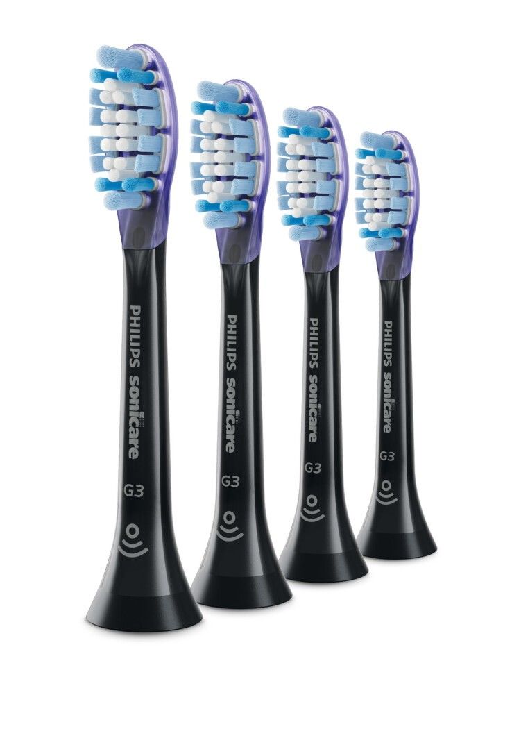 Quattro testine Philips Sonicare G3 Premium Gum Care. Manici neri, setole blu e bianche.