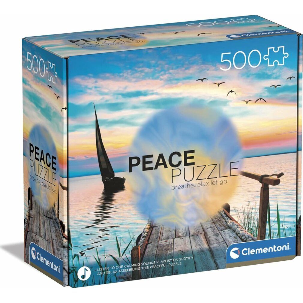 Scatola puzzle da 500 pezzi. Immagine di lago con barca a vela, pontile e tramonto. Marchio: Clementoni. Testo: Peace Puzzle.