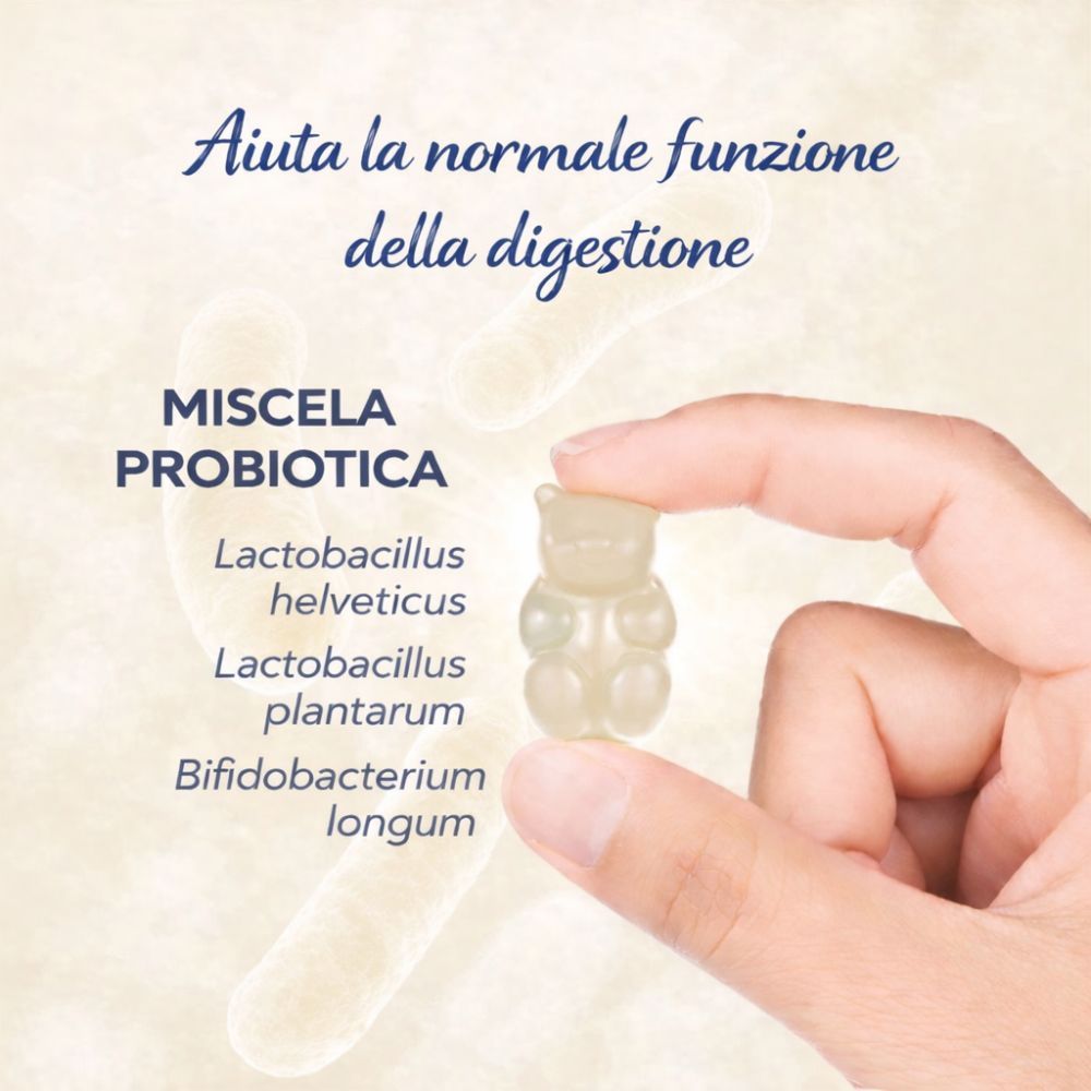 Mano che tiene un orsetto gommoso chiaro. Testo: Miscela probiotica, Lactobacillus helveticus, Lactobacillus plantarum, ecc.