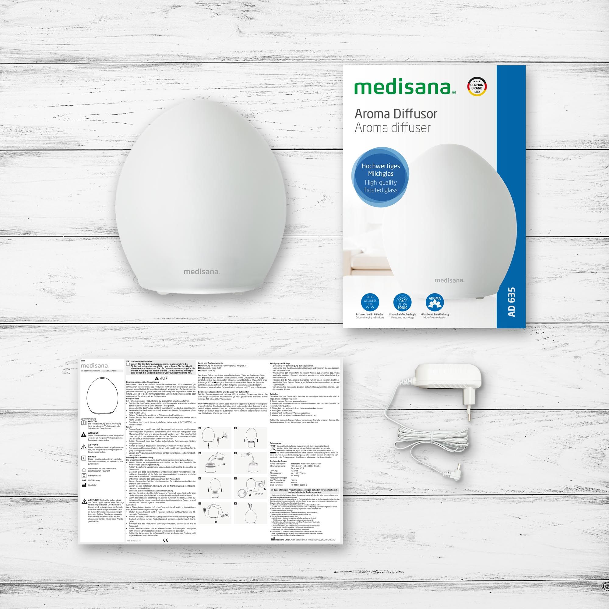 Diffusore di aromi medisana, confezione, istruzioni e alimentatore.
