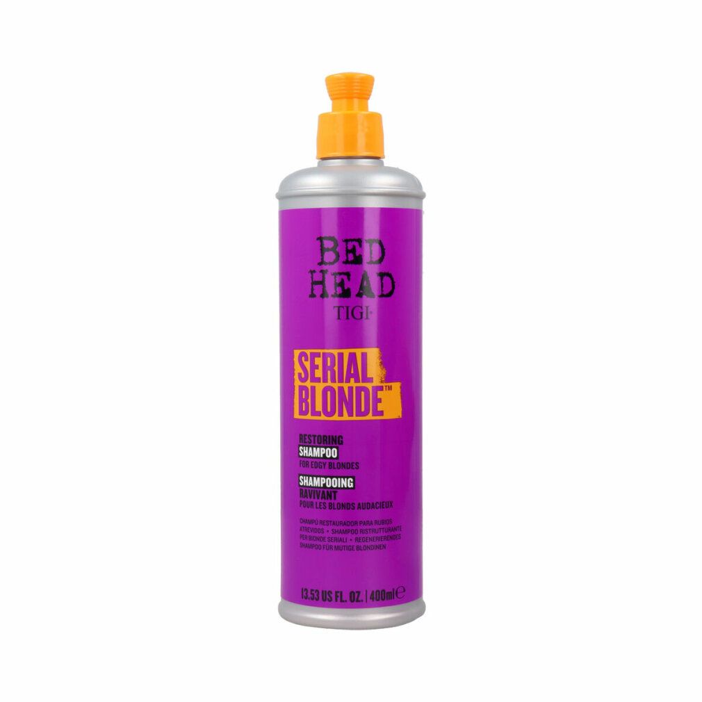Flacone di shampoo viola con tappo giallo. Scritta: Bed Head Tigi Serial Blonde. Restoring Shampoo.