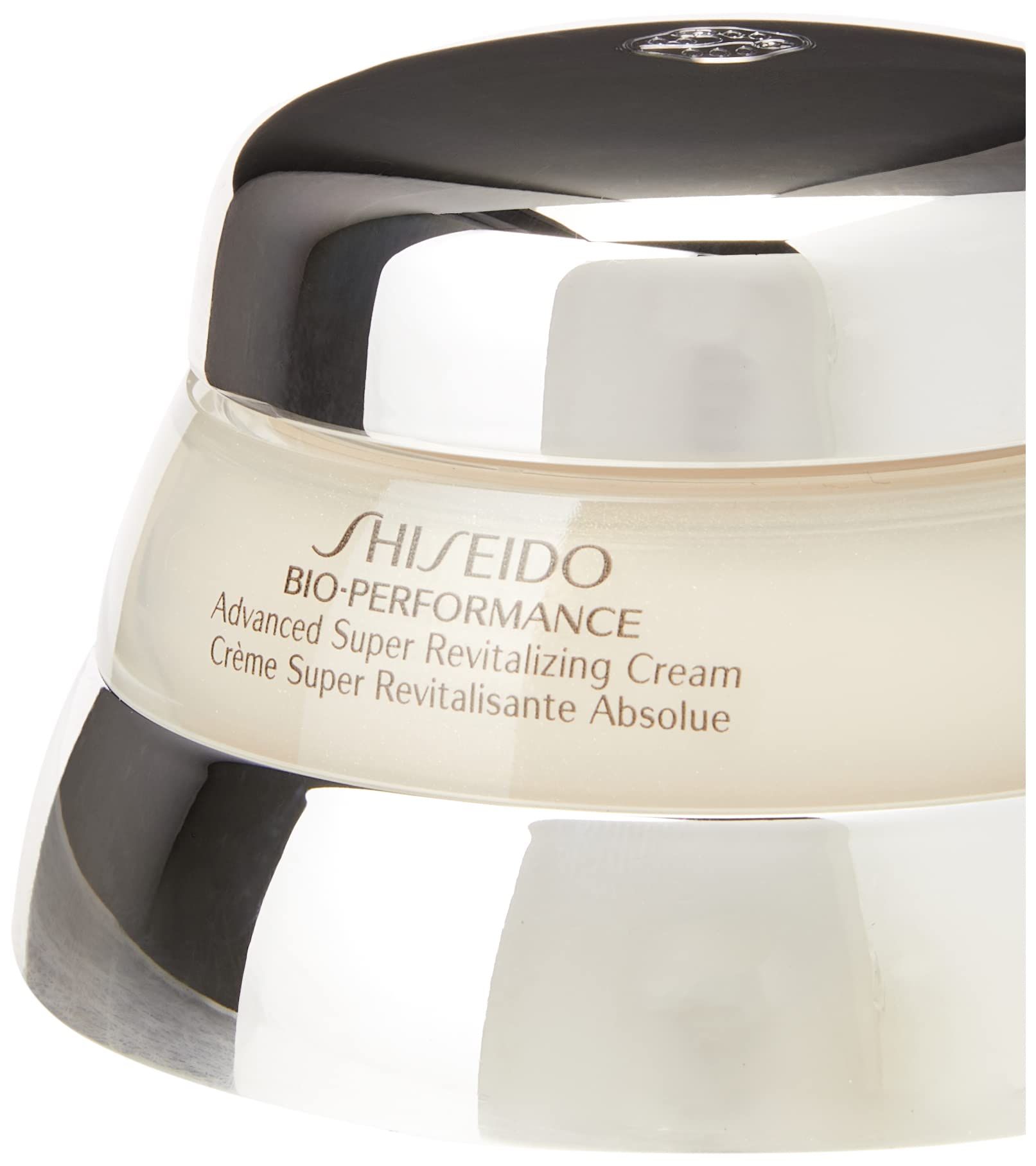 Vaso di crema con bordo argentato e coperchio bianco. Scritta: SHISEIDO BIO-PERFORMANCE Advanced Super Revitalizing Cream. Primo piano.