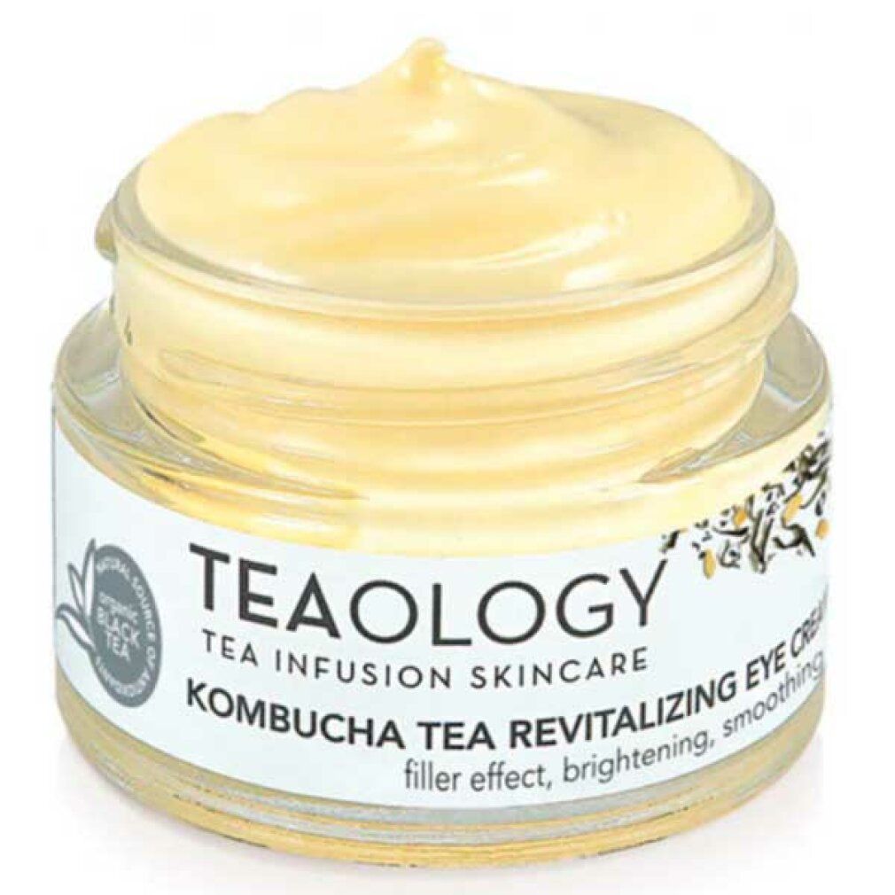 Vasetto in vetro con crema giallastra. L'etichetta riporta "TEAOLOGY", "Kombucha Tea Revitalizing Eye Cream".