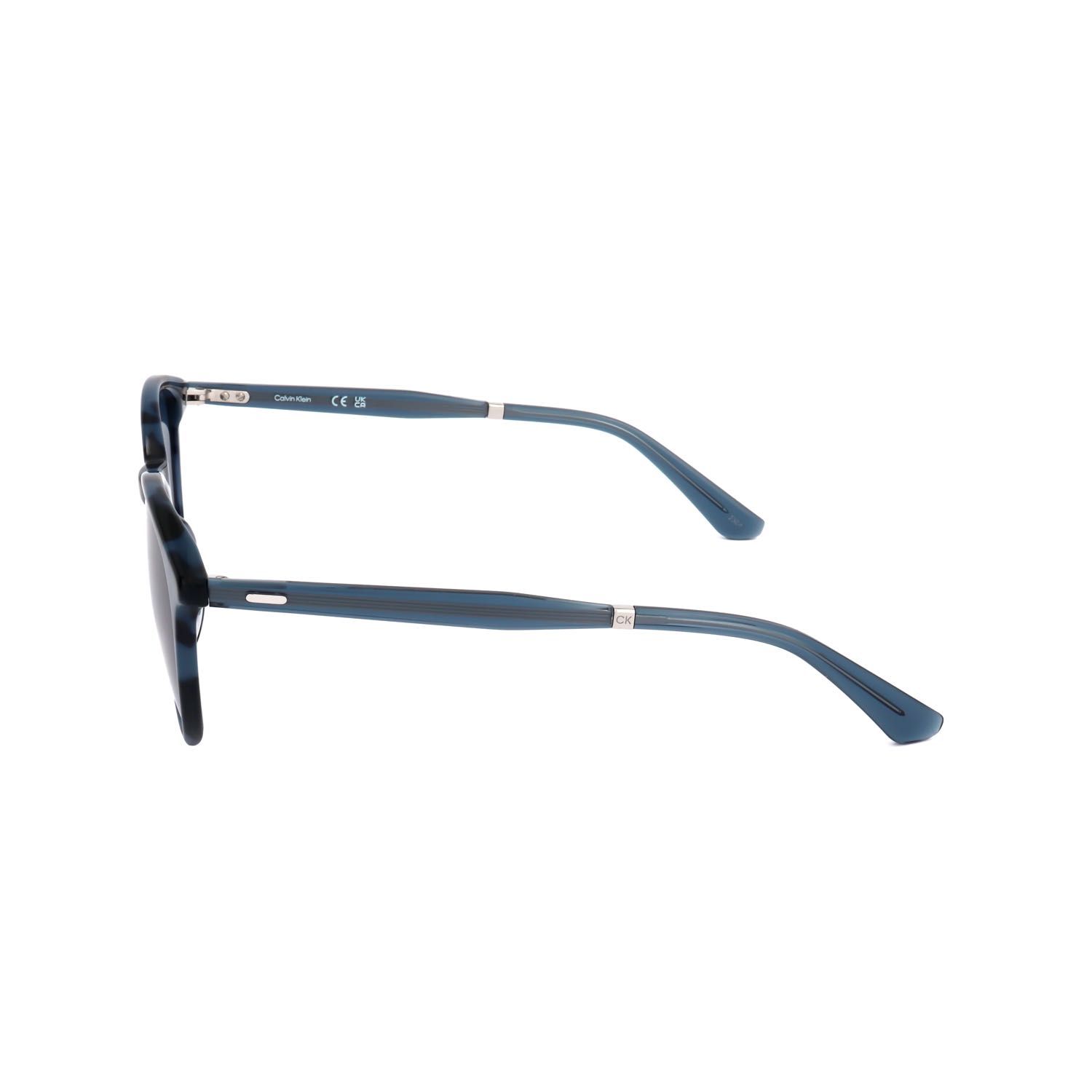 Occhiali blu con motivo marmorizzato, vista laterale. Marchio CE visibile.