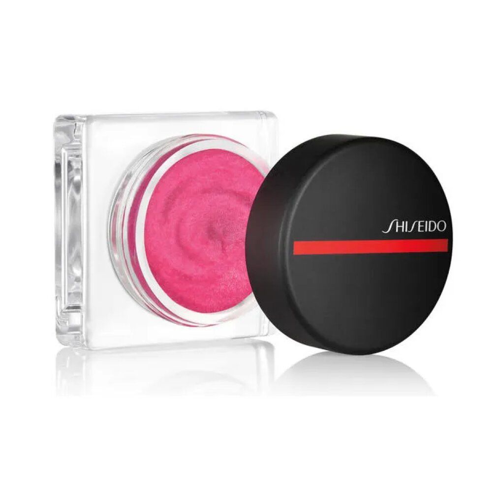 Coperchio nero rotondo con linea rossa e scritta SHISEIDO. Accanto, contenitore quadrato aperto con prodotto rosa.