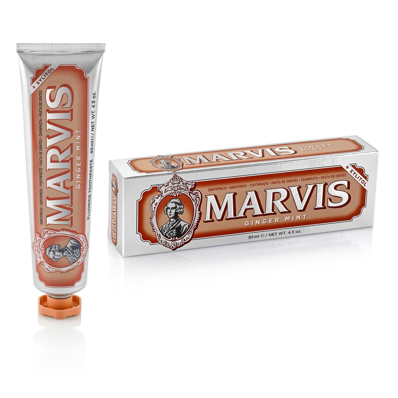 Tubo di dentifricio e scatola. Tubo con etichetta arancione e MARVIS GINGER MINT. Scatola con lo stesso design.