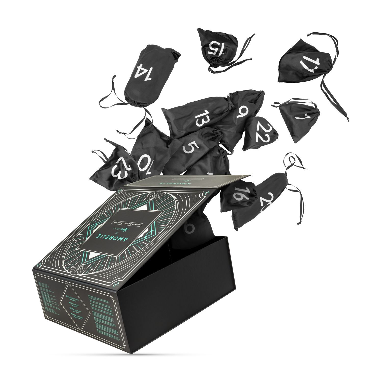 Scatola del calendario dell'Avvento aperta, con sacchetti neri numerati da 9 a 23 che cadono. Logo AMORELIE visibile.