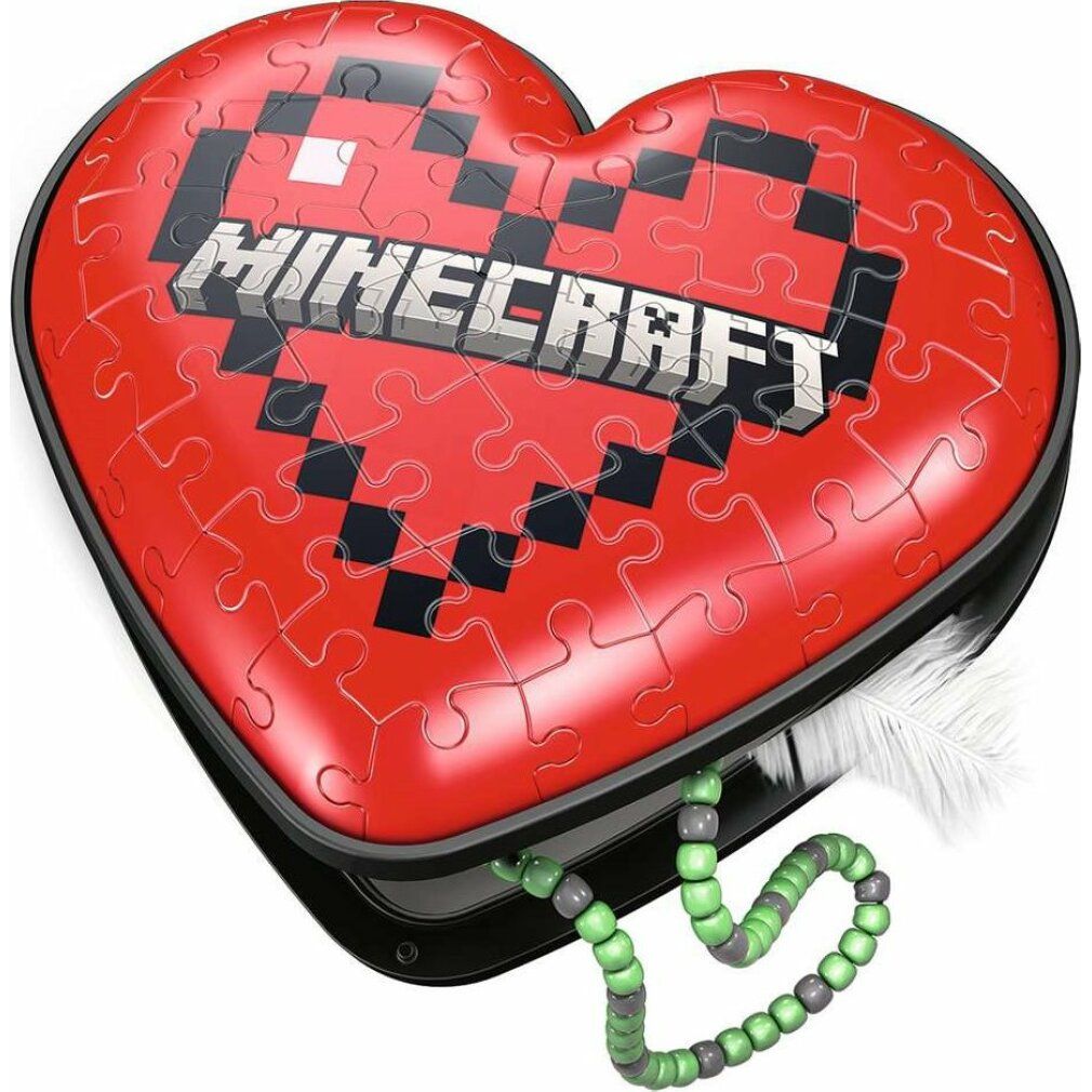 Puzzle 3D Cuore di Minecraft assemblato. Cuore rosso con logo Minecraft. Pezzi del puzzle visibili. Catena verde.