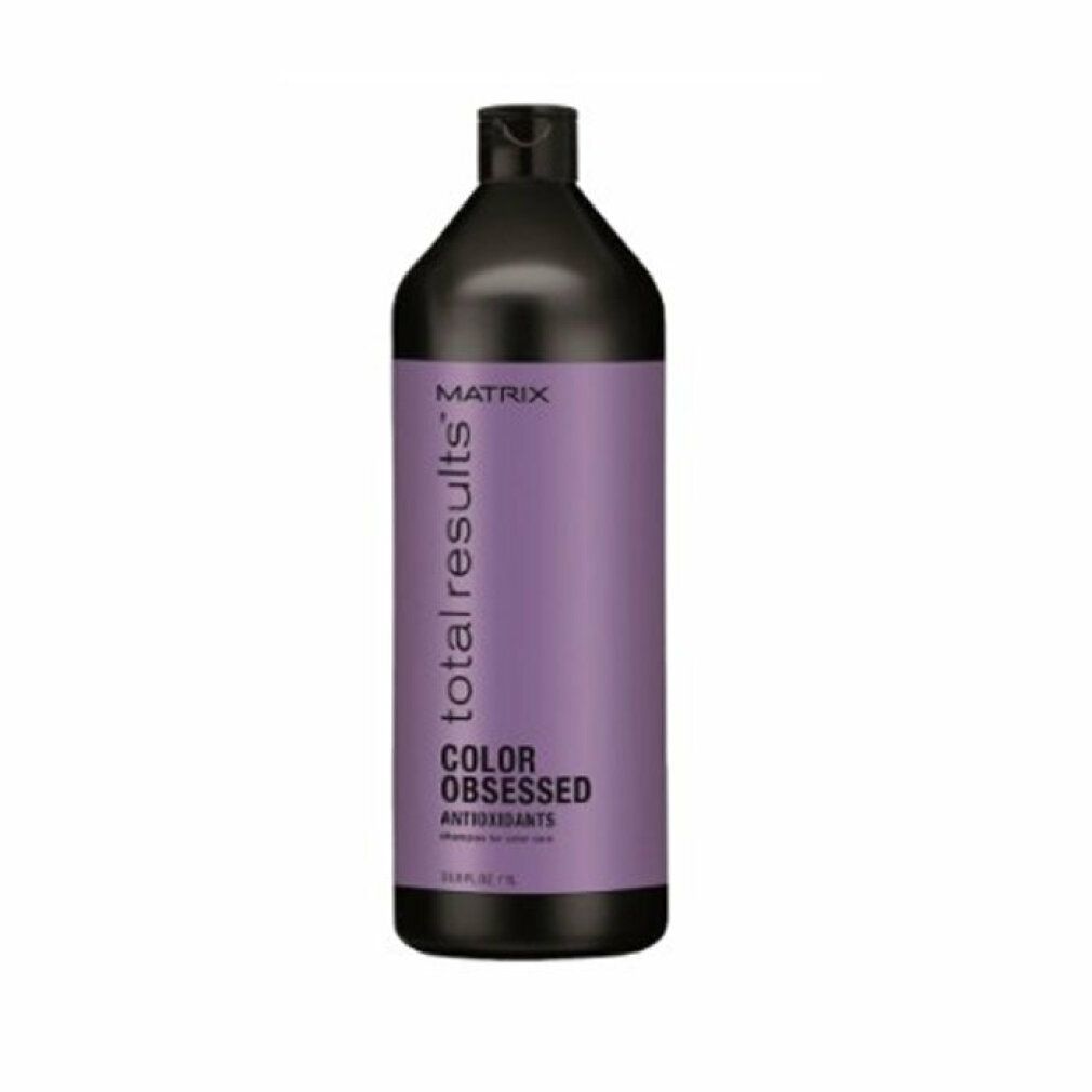 Flacone nero con etichetta viola. Scritta: Matrix Total Results Color Obsessed Shampoo. 1 litro.