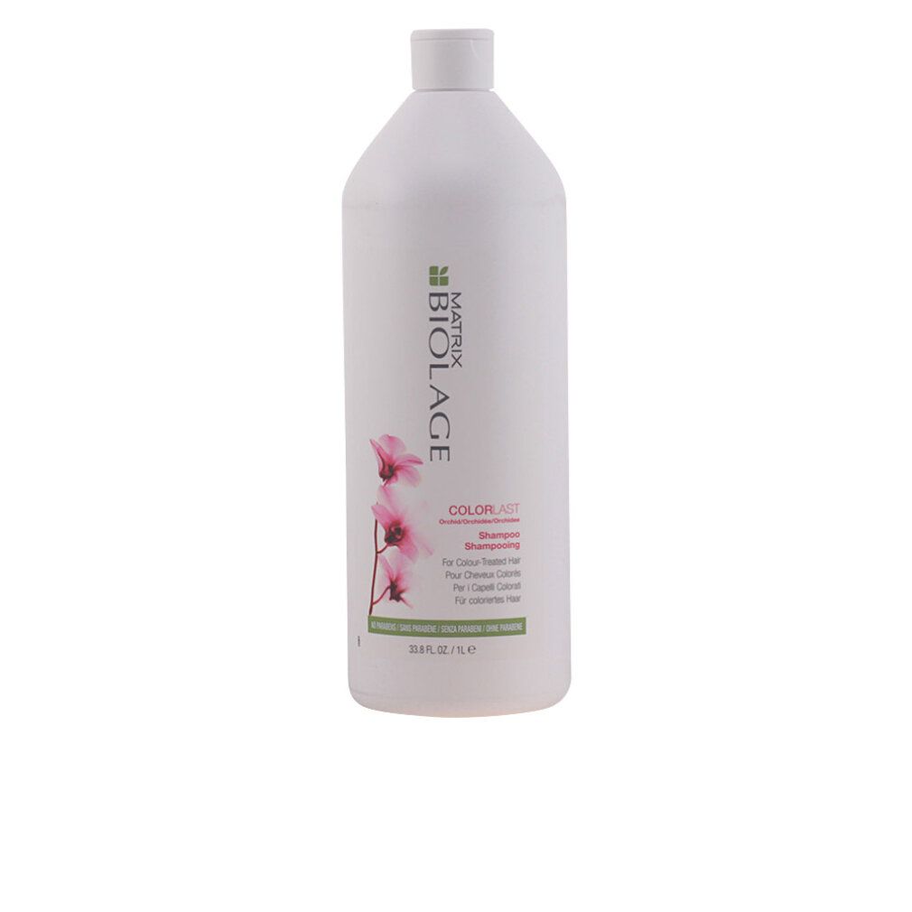 Flacone di shampoo bianco con logo Matrix Biolage ed etichetta Colorlast. Include un'illustrazione di un fiore rosa.