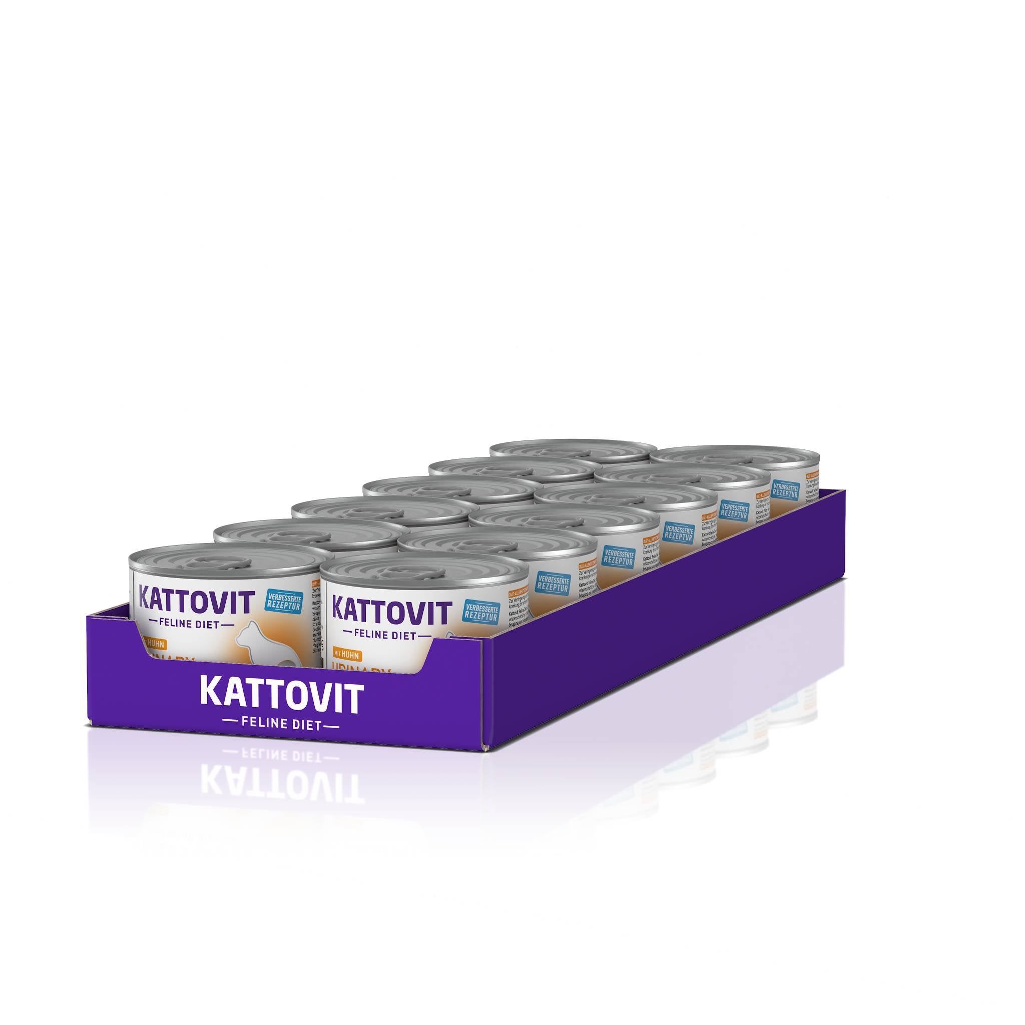 Lattine Kattovit Urinary Huhn in scatola viola. Diverse lattine con etichetta bianca. Nome prodotto e testo: Urinary, Profilassi calcoli struvite (FLUTD).