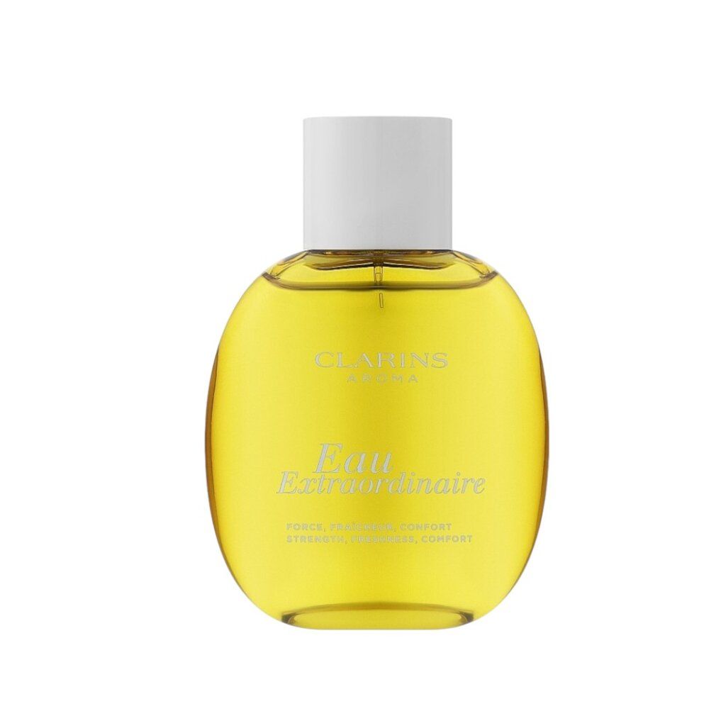 Flacone rotondo con liquido giallo. Tappo bianco. Scritta: Eau Extraordinaire, Clarins Aroma.