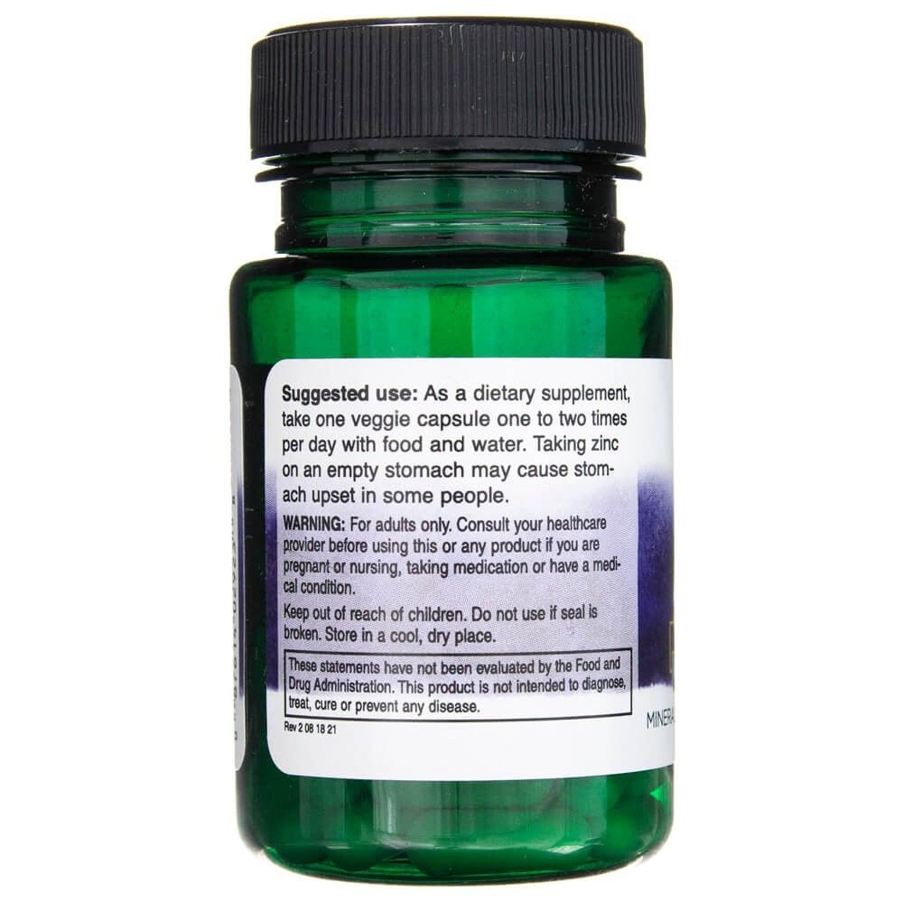 Lato di una bottiglia di capsule di orotato di zinco con istruzioni per l'uso e avvertenze.