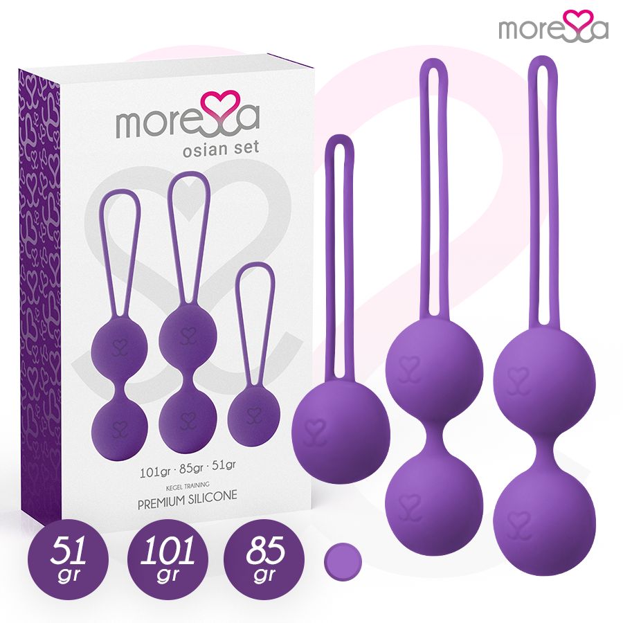 Confezione e tre palline di gravità in silicone viola con pesi.