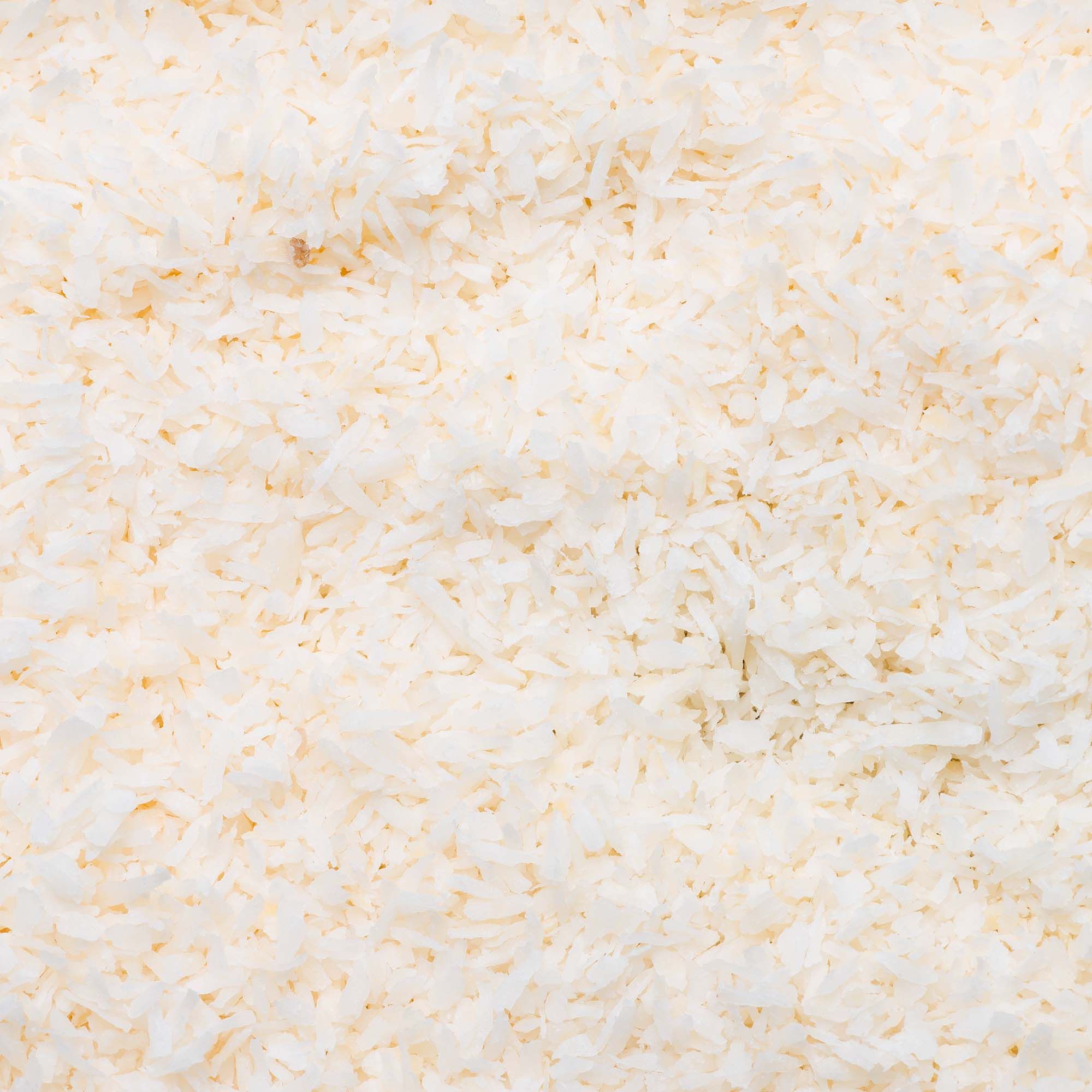 Cocco grattugiato fine, bianco e soffice.