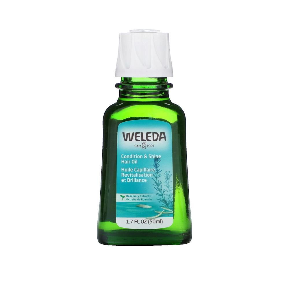 Flacone di vetro verde con tappo bianco. Scritte: WELEDA, Condition & Shine Hair Oil, 1.7 FL OZ (50ml).