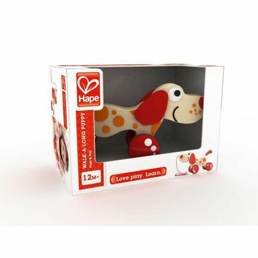 Hape Cane da trascinare Pepe nella confezione. Scatola bianca con immagine, logo, testo "WALK-A-LONG PUPPY" ed età.