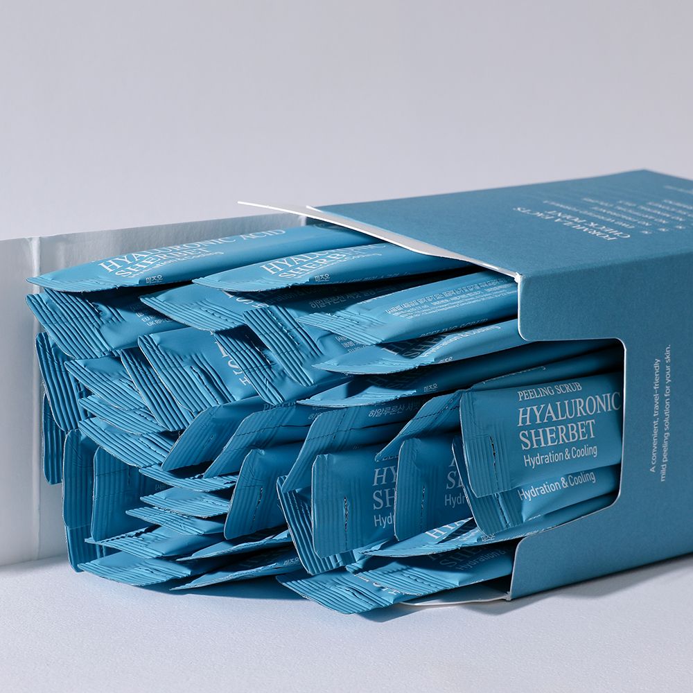 Confezione aperta di MIZON Hyaluronic Acid Sherbet Peeling Scrub. Sono visibili molte bustine singole.